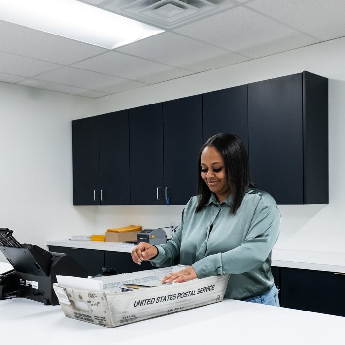 One of our expert team members sorting through the mail.